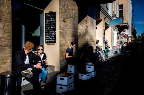 Berlin, June 2015.People relaxingi in Schlesische Strasse.is the capital of Germany, and one of the 16 states of Germany. With a population of 3.5 million people, Berlin is Germany's largest city. It is the second most populous city  and the seventh most populous urban area in the European Union