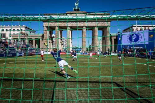 Berlin, June 2015. Soccer game under the Brandenburg door. Berlin is the capital of Germany, and one of the 16 states of Germany. With a population of 3.5 million people, Berlin is Germany's largest city. It is the second most populous city  and the seventh most populous urban area in the European Union