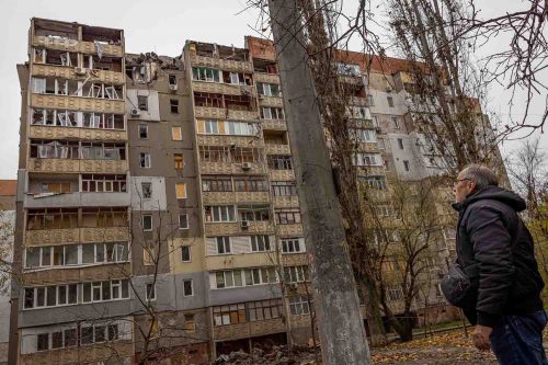 Ukraine, Mykolaiv, Nov 2022. Destruction on the streets of Mykolaiv a two-hour drive from the red line dividing Russian and Ukrainian troops where there is still brisk fighting. Residents have been without water and electricity for days and live amid bombed-out buildings.