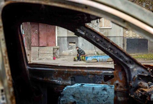 Ukraine, Mykolaiv, Nov 2022. Destruction on the streets of Mykolaiv a two-hour drive from the red line dividing Russian and Ukrainian troops where there is still brisk fighting. Residents have been without water and electricity for days and live amid bombed-out buildings.