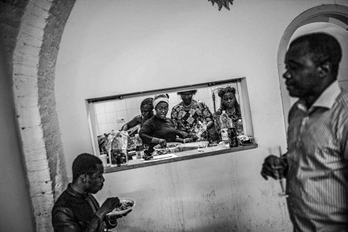 Rome, Italy, may 2013. Nigerian immigrants come together to create a collection to help a family of Nigerians who are about to lose their homes because of the crisis.