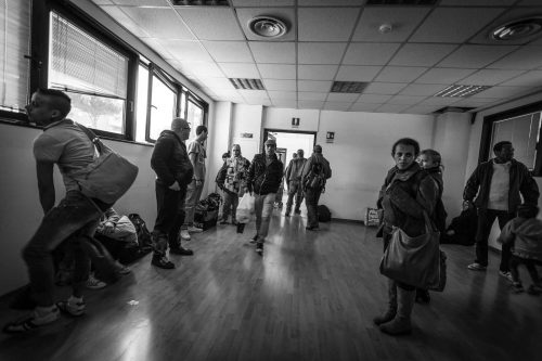 Rome, Italy, apr,2014. A group of homeless from both Italian and non-EU countries occupy an abandoned building that up to nine months ago belong to the offices of the National Social Security Institute (INPS).Un gruppo di senza casa sia italiani che provenienti da paesi extracomunitari occupano un edificio abbandonato che fino a 9 mesi fa era la sede di uffici dell Istituto Nazionale della Previdenza Sociale (INPS).