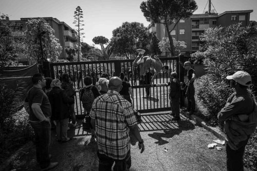 Rome, Italy, apr,2014. A group of homeless from both Italian and non-EU countries occupy an abandoned building that up to nine months ago belong to the offices of the National Social Security Institute (INPS).Un gruppo di senza casa sia italiani che provenienti da paesi extracomunitari occupano un edificio abbandonato che fino a 9 mesi fa era la sede di uffici dell Istituto Nazionale della Previdenza Sociale (INPS).