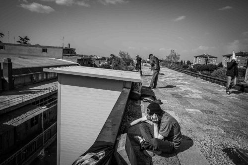Rome, Italy, apr,2014. A group of homeless from both Italian and non-EU countries occupy an abandoned building that up to nine months ago belong to the offices of the National Social Security Institute (INPS).Un gruppo di senza casa sia italiani che provenienti da paesi extracomunitari occupano un edificio abbandonato che fino a 9 mesi fa era la sede di uffici dell Istituto Nazionale della Previdenza Sociale (INPS).