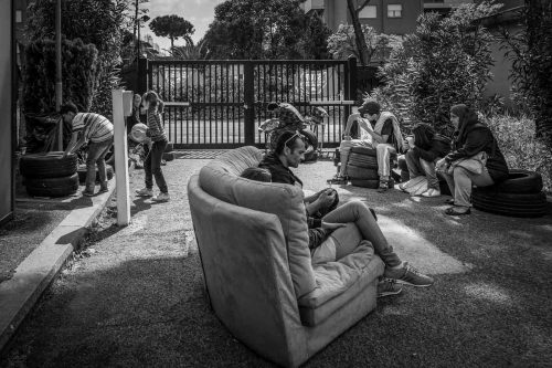 Rome, Italy, apr,2014. A group of homeless from both Italian and non-EU countries occupy an abandoned building that up to nine months ago belong to the offices of the National Social Security Institute (INPS).Un gruppo di senza casa sia italiani che provenienti da paesi extracomunitari occupano un edificio abbandonato che fino a 9 mesi fa era la sede di uffici dell Istituto Nazionale della Previdenza Sociale (INPS).