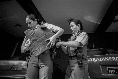 Santiago de Chile, 2003-2006:policewoman dressing with bullet-proof jaket